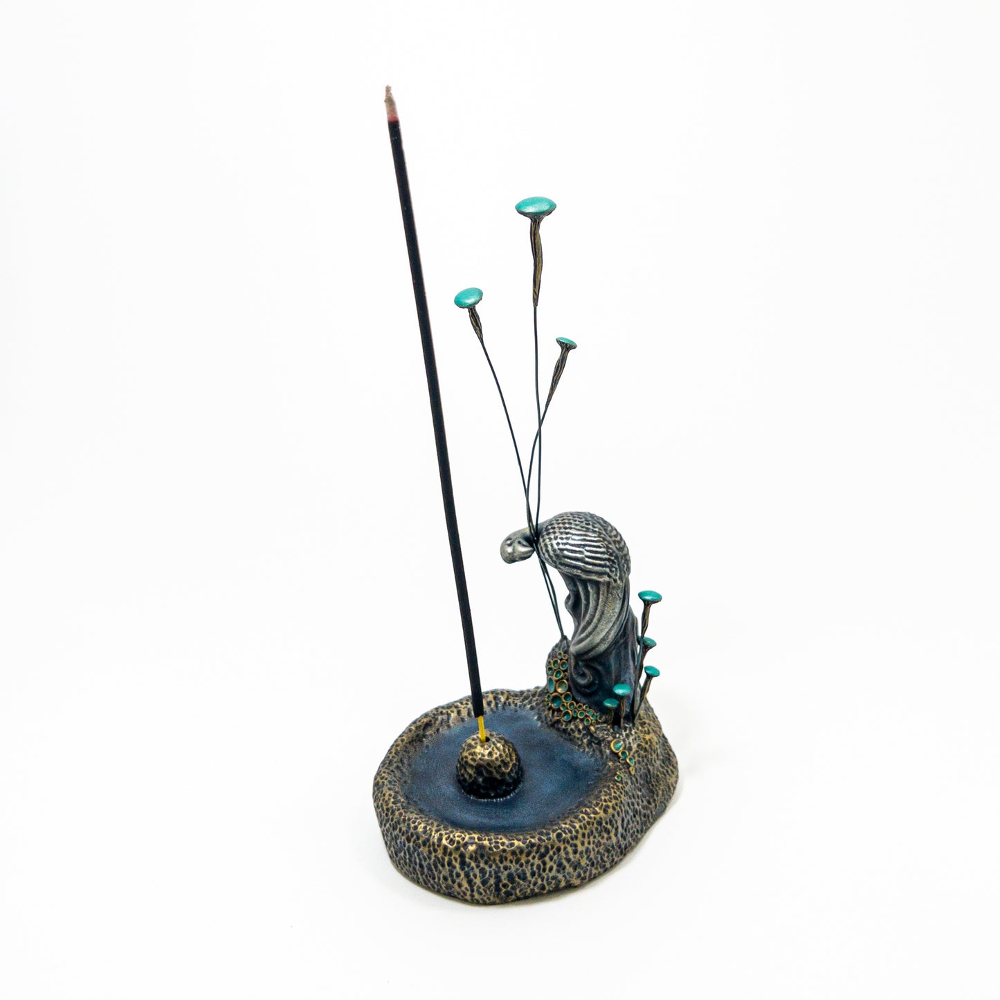 Handmade fungi incense burner with tall patina mushroom caps.
