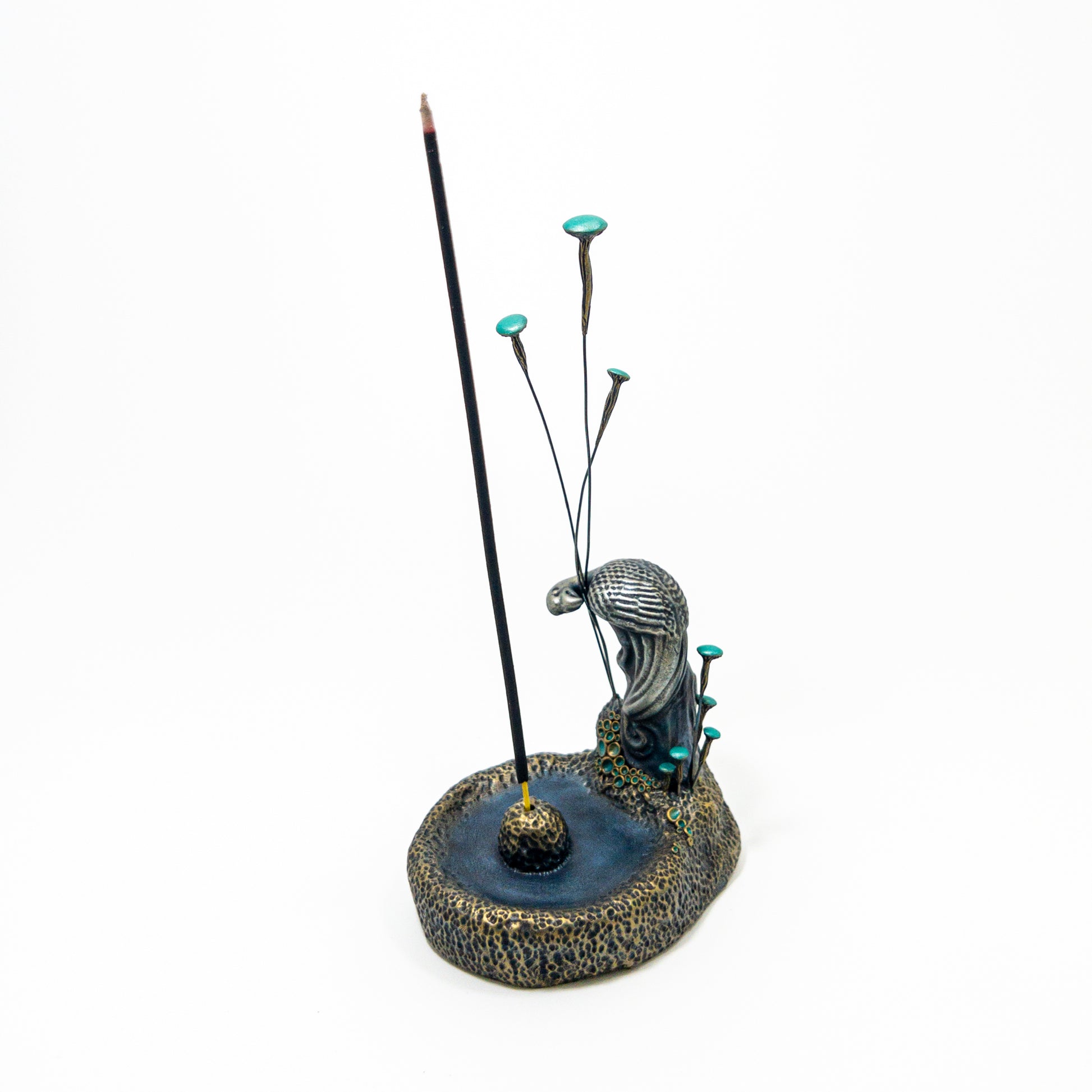 Handmade fungi incense burner with tall patina mushroom caps.